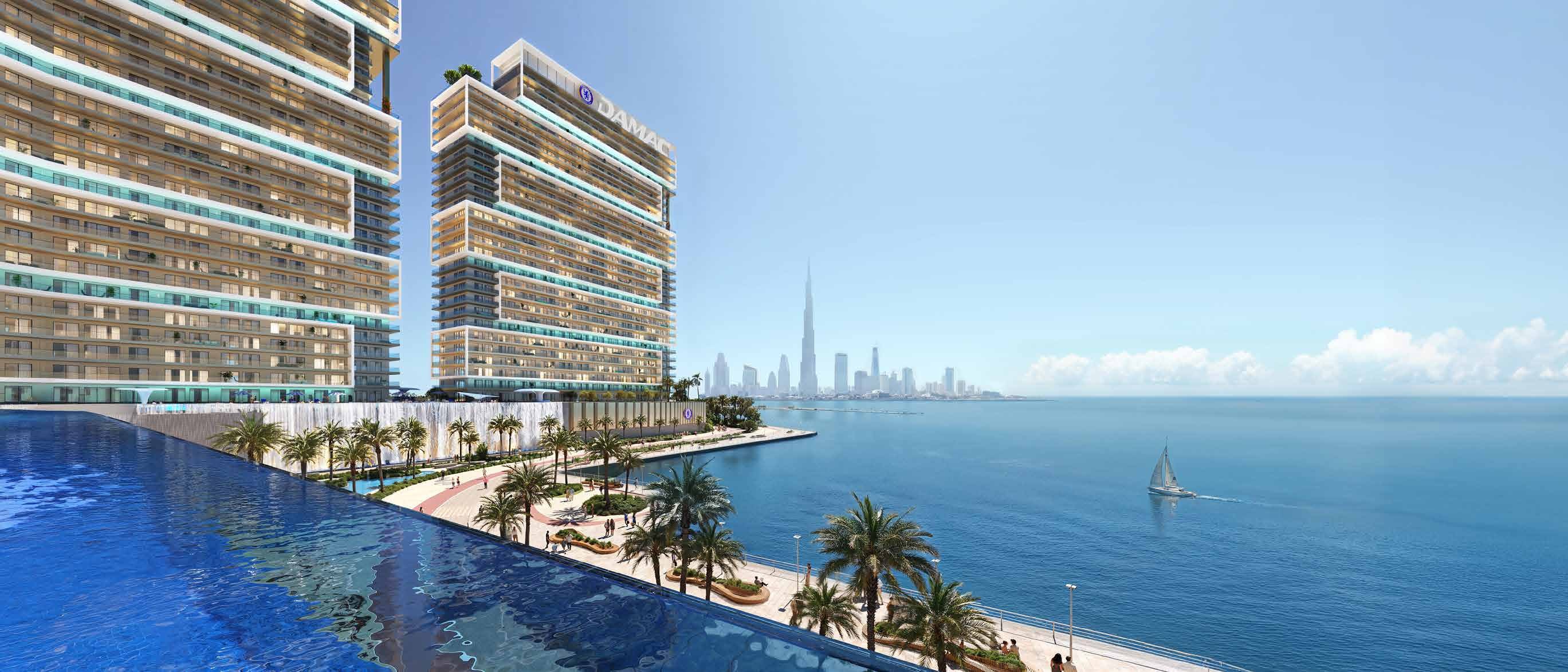 Chelsea Residences Tower C from the sea: the tower above a waterfront pool and promenade.