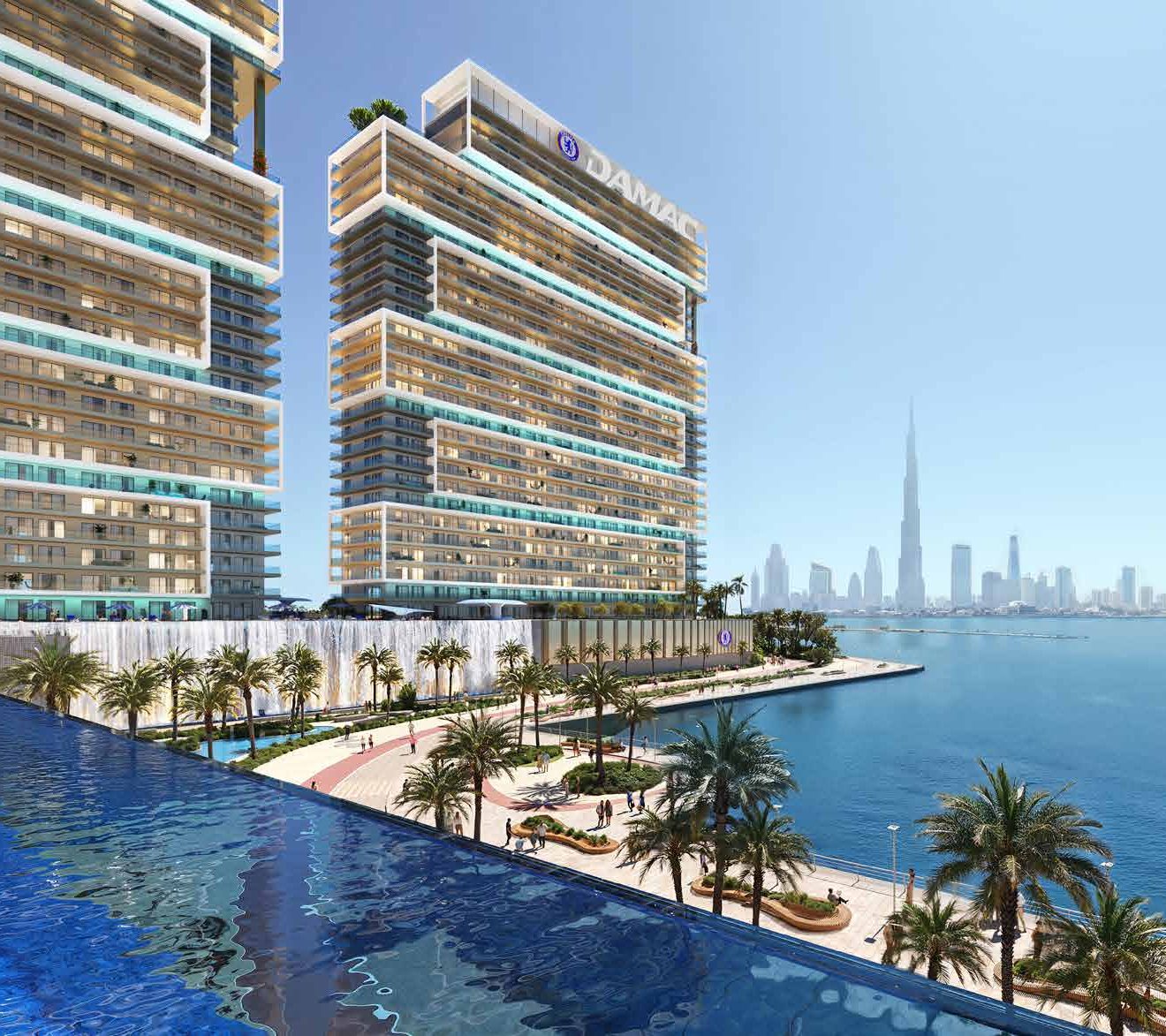 Tower C above an infinity pool on the waterfront, the Downtown skyline on the horizon.