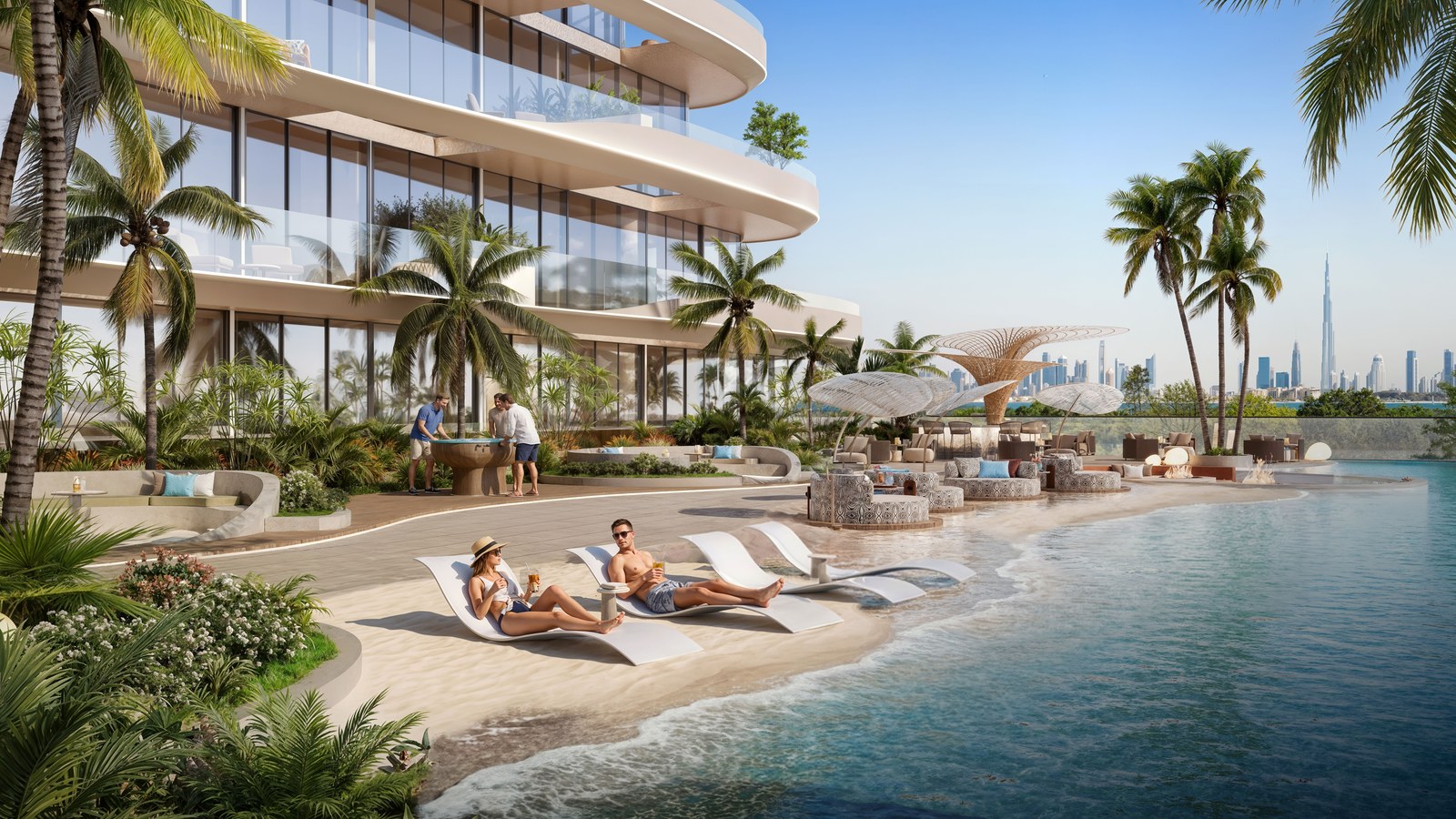 The beach-style pool: loungers on a sand edge, the Downtown skyline in the distance.